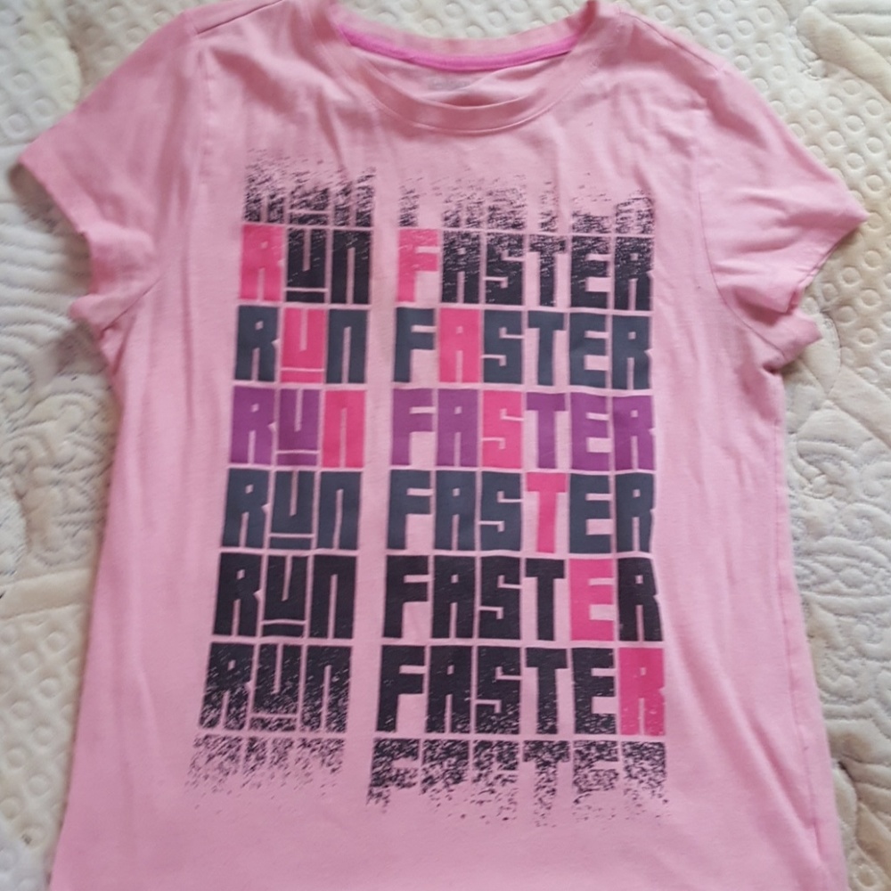 A pink shirt that has run faster